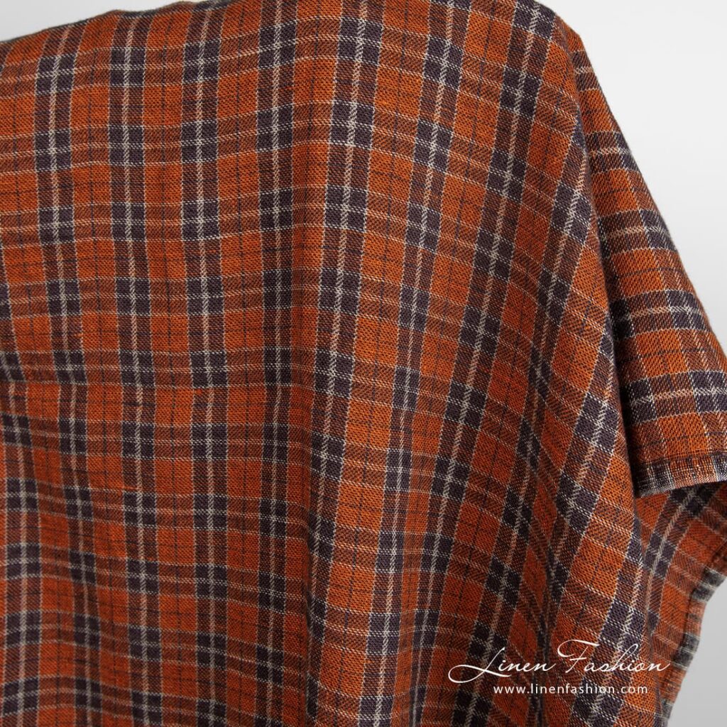 Oranssi ruudullinen pesty pellavavillakangas 2 Orange linen wool fabric in checks, specially washed to increase softness