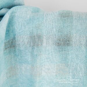 Linen fabric in light blue and light turquoise melange