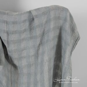 Läpikuultava pesty pellavakangas harmain ruuduin