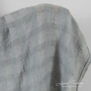 Läpikuultava pesty pellavakangas harmain ruuduin