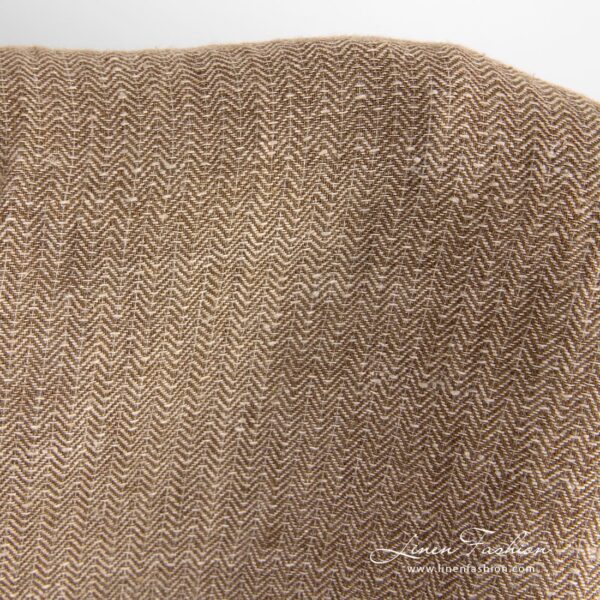Brown linen fabric in herringbone pattern