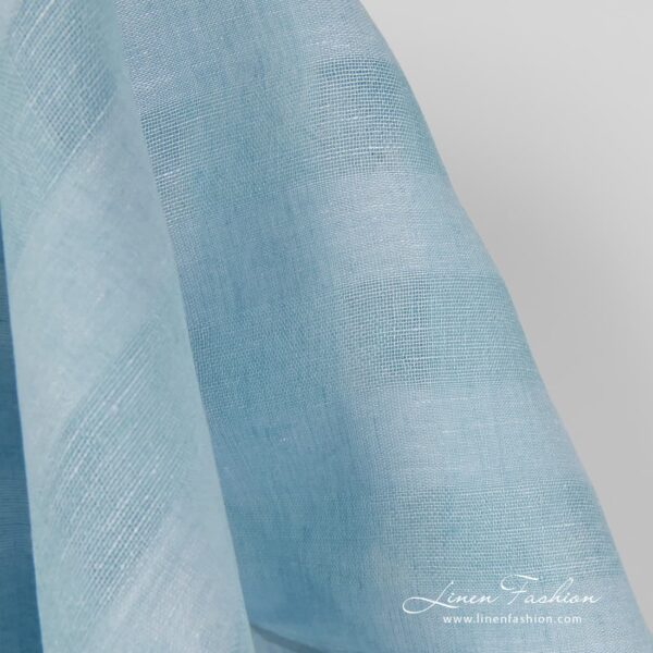 Checked linen fabric in aquamarine colour.