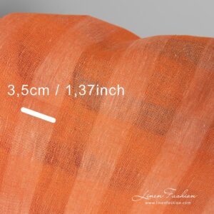 Pellavakangas, jossa on persikanoranssi läpikuultava ruutukuosi