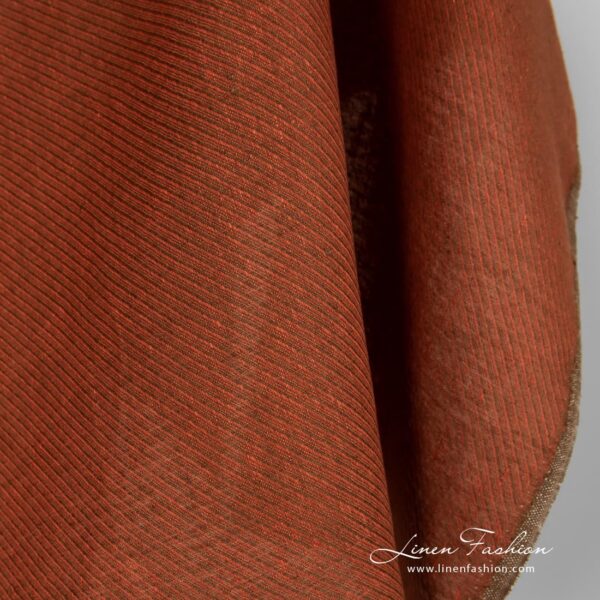 Rust orange linen fabric in brown twill