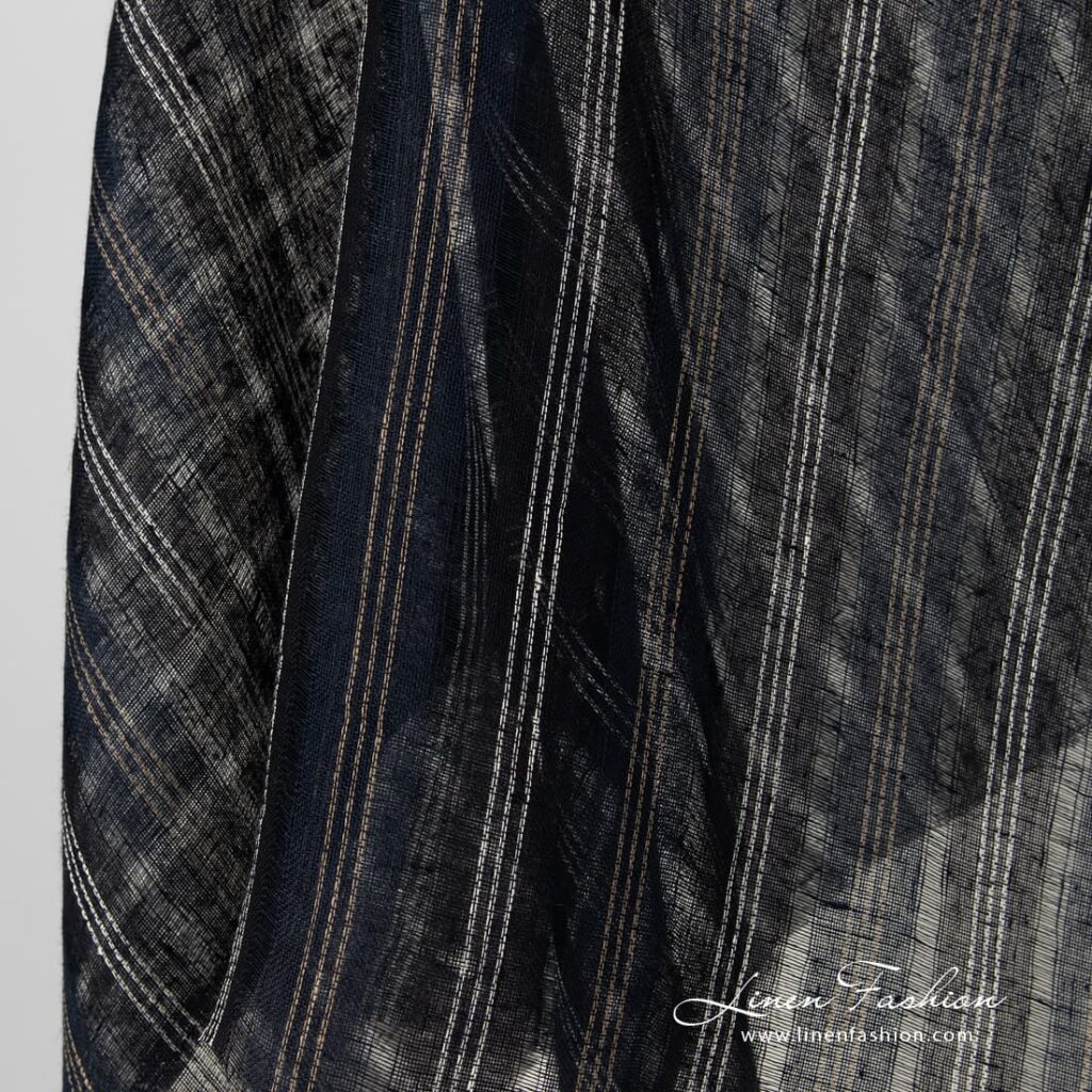 Läpinäkyvä tummansininen raidallinen pellavakangas 3 Navy linen fabric in stripes.