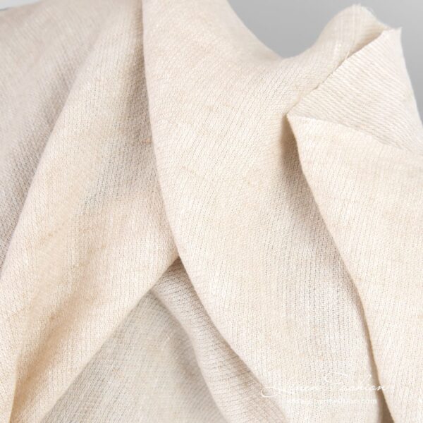 Linen fabric in light sand color, specially washed