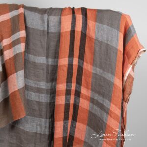 Pellavakangas oransseilla ja ruskeilla raidoilla pesty 9 Linen fabric in orange and brown stripes