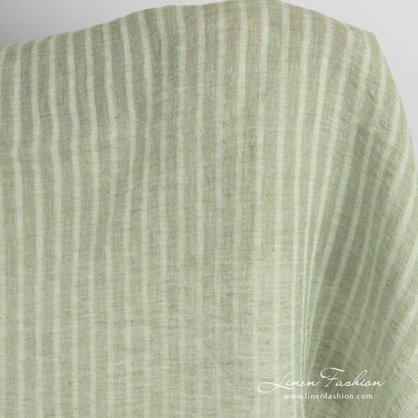 Green linen fabric in transparent stripes