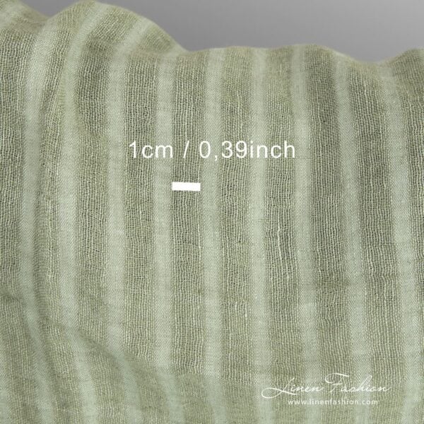 Green linen fabric in stripes, specially washed
