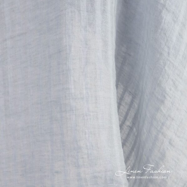 Blue linen fabric in vertical transparent stripes