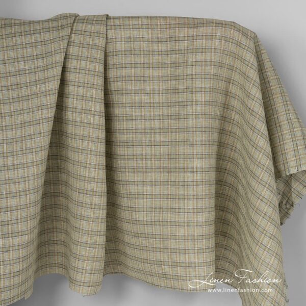 Checked linen fabric in green colour.