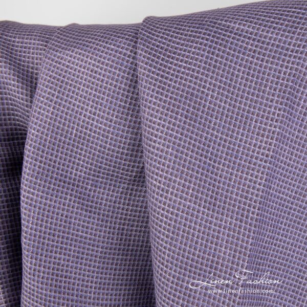 Checked linen fabric in purple colour.