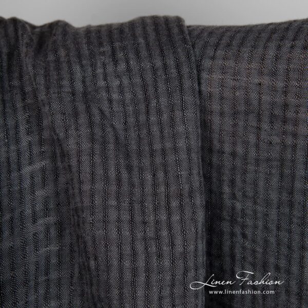 Linen fabric in transparent checks woven from black and dark grey yarns