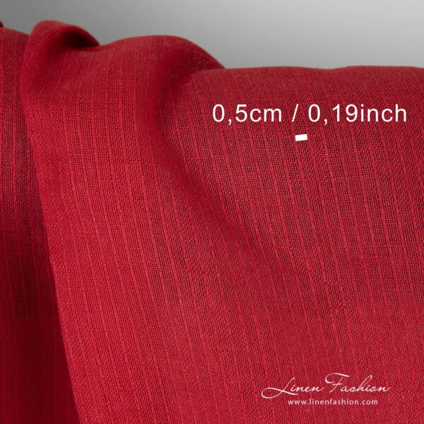 Transparent red linen cotton fabric in decorative vertical stripes
