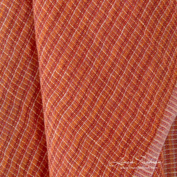 Transparent linen fabric in orange melange, perfect for curtains, shawls