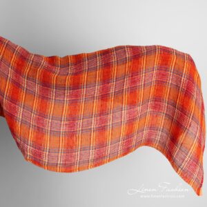 Läpikuultava oranssiruudullinen pesty pellavakangas