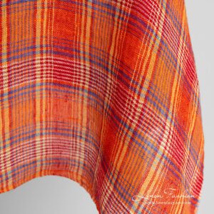 Läpikuultava oranssiruudullinen pesty pellavakangas