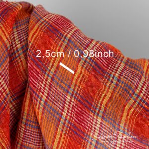 Läpikuultava oranssiruudullinen pesty pellavakangas