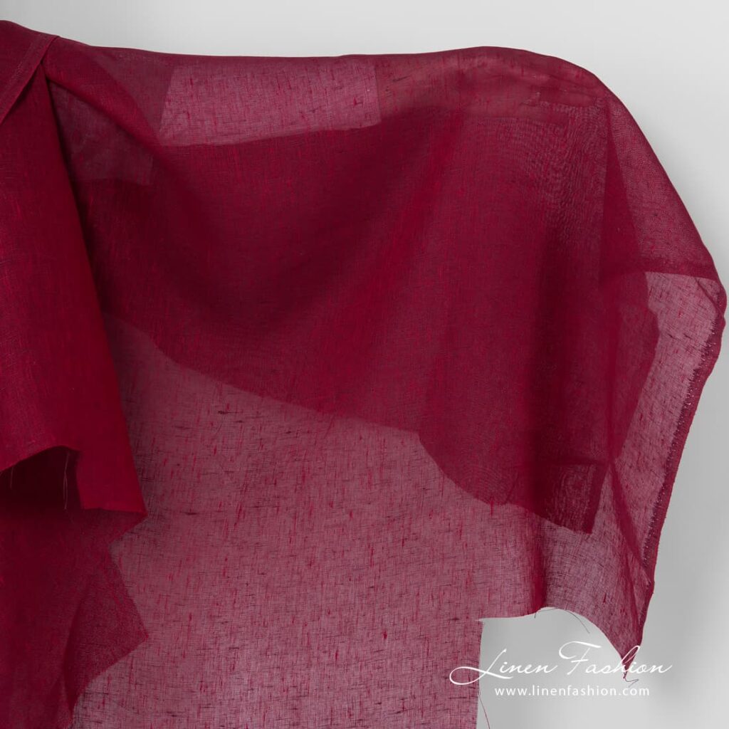 Gauze dark red melange linen fabric.
