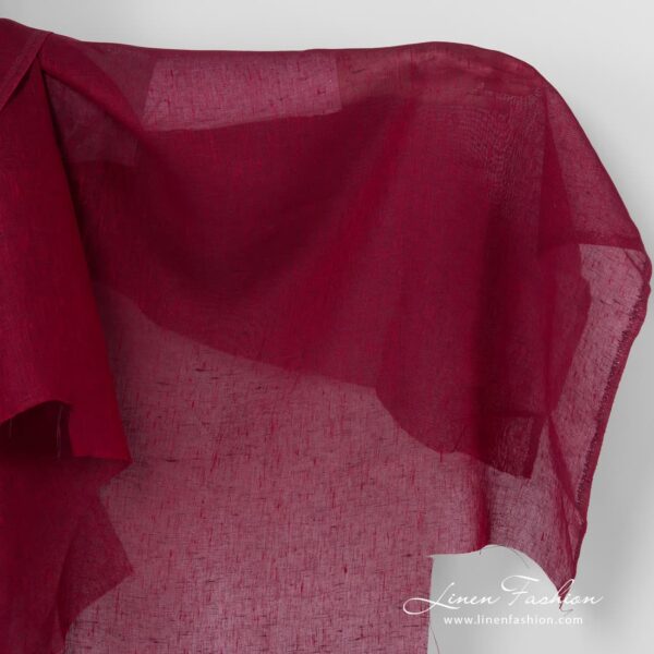 Gauze dark red melange linen fabric.