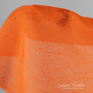 Bright orange 100% linen fabric.