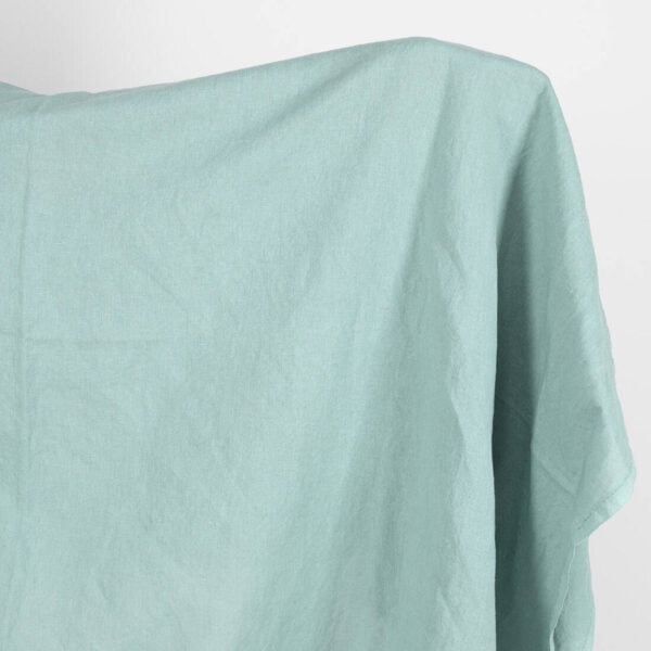 Linen cotton fabric in jadeite colour, washed